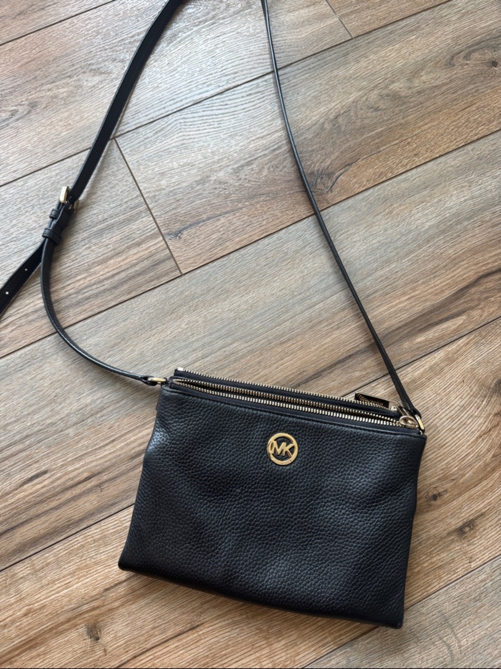 Michael Kors Black Leather Gold-Accent Crossbody bag with wallet compartment